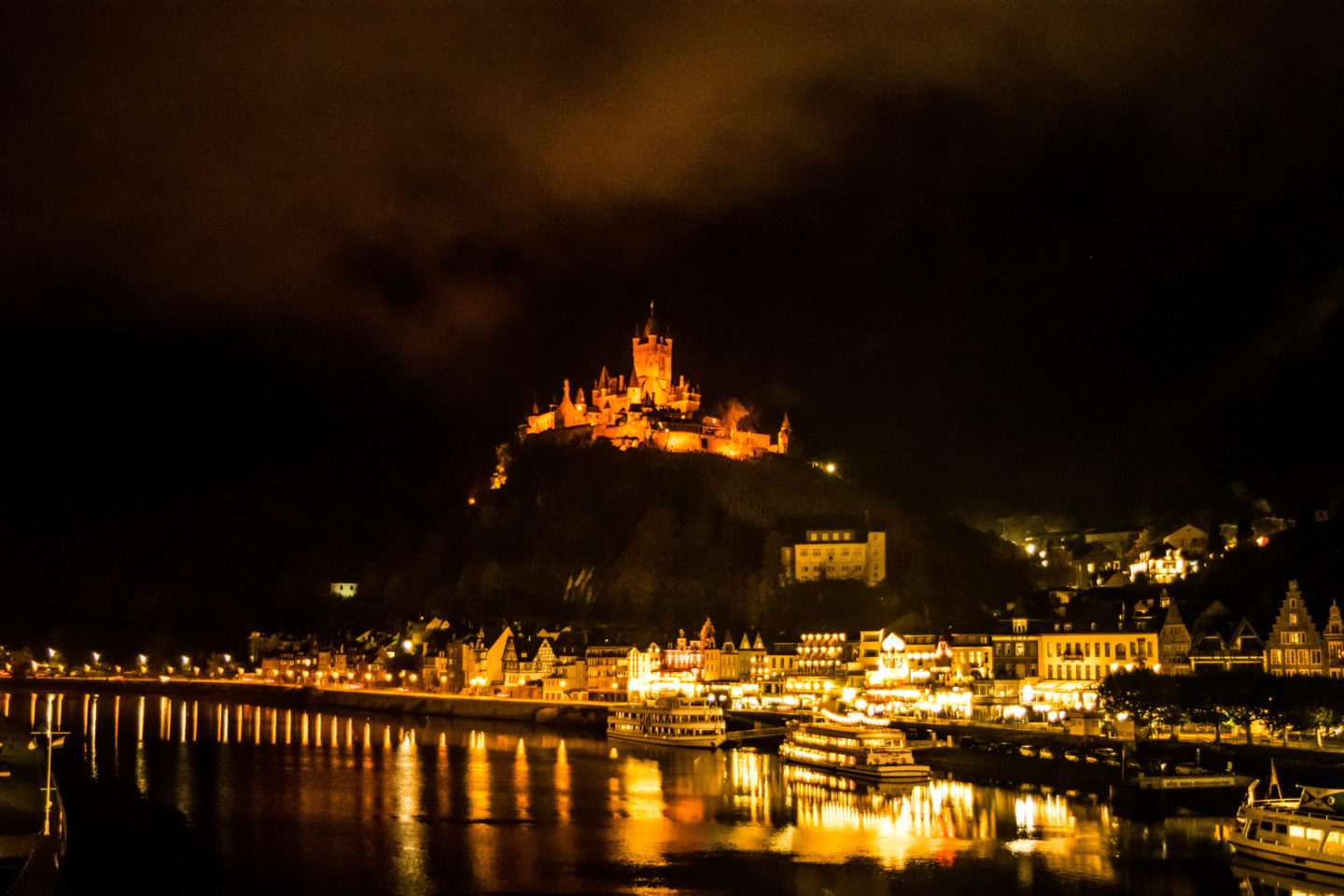 The Cochem Castle lit up at night